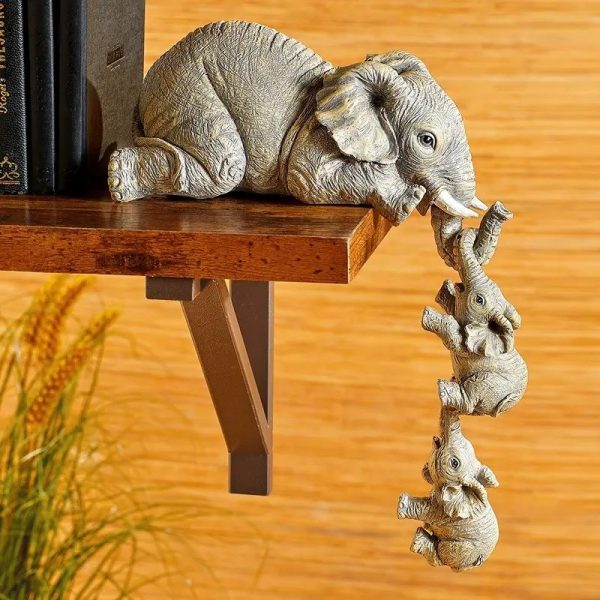 Fun Ceramic Elephant Ornaments Designed to Hang Playfully By Their Trunks From any Surface These Little Guys Bring Instant Humor and Charm - Image 4